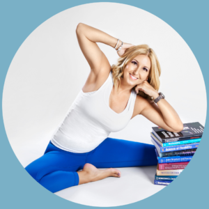 Photo of Jules in a yoga pose with her elbow propped up on a stack of textbooks. She is smiling at the camera. The photograph is in a circle shape with a blue background.